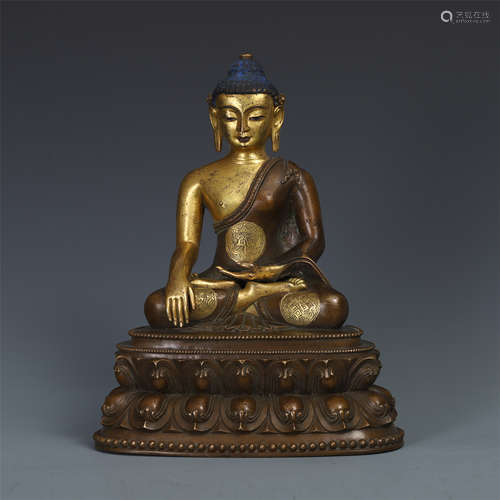 CHINESE PARTLY GILT BRONZE SEATED SAKAYMUNI