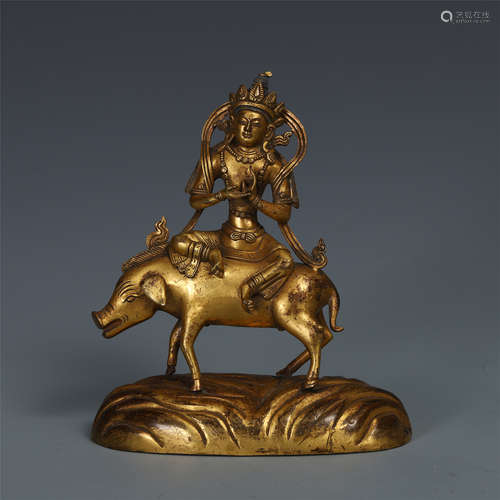 TIBETAN GILT BRONZE BUDDHIST GUARDIAN ON PIG