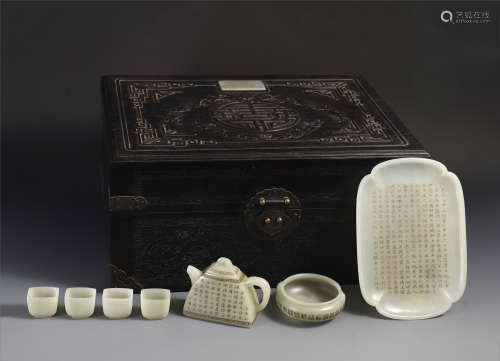 SEVEN CHINESE JADE TEA VESSELS IN ROSEWOOD CASE