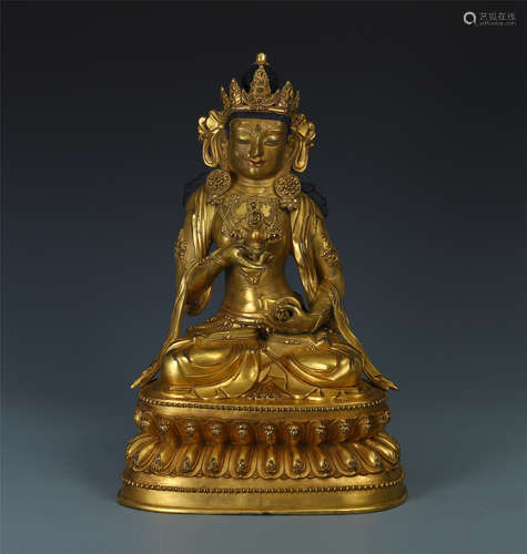 TIBETAN GILT BRONZE SEATED BUDDHA ON LOTUS BASE