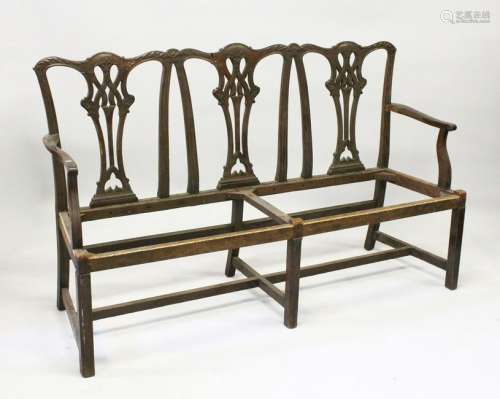 A CHIPPENDALE STYLE MAHOGANY THREE SEATER CHAIR BACK