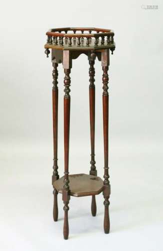 A TWO-TIER MAHOGANY JARDINIERE STAND.  33cms diameter x