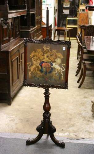 A VICTORIAN ROSEWOOD POLE SCREEN, the screen with a