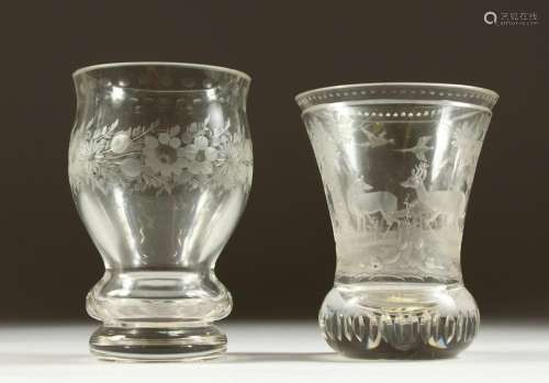 A PLAIN GLASS BOHEMIAN BEAKER, etched with deer in a
