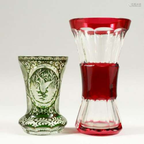 A BOHEMIAN GREEN BEAKER, engraved with deer and ducks,
