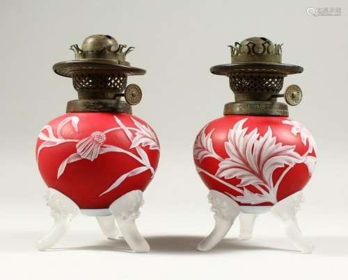 A PAIR OF RED AND WHITE CAMEO GLASS OIL LAMP BASES,