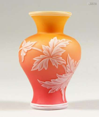 A GOOD THREE-COLOUR VASE, with leaves and flowers.