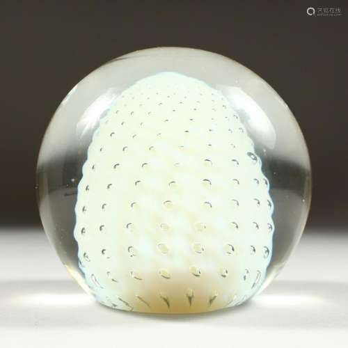 A HEAVY GLASS PAPERWEIGHT.  4ins.