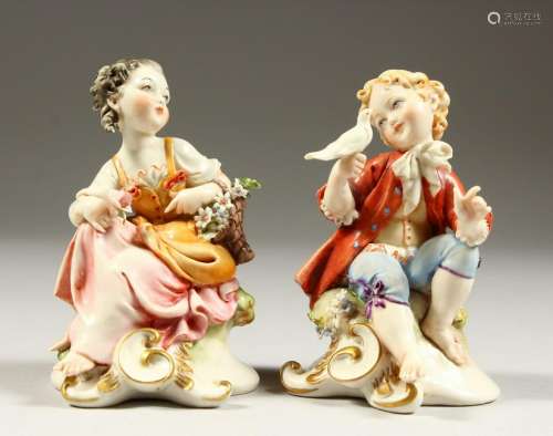 A PAIR OF CAPODIMONTE FIGURES OF A BOY AND GIRL.  12cms