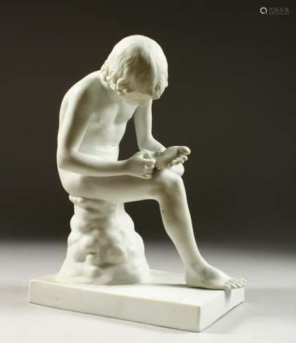 A PARIAN WARE GROUP, young boy picking a thorn from his