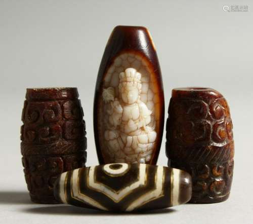 FOUR TIBETAN BEADS.