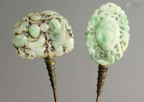 TWO HAIR PINS WITH CARVED JADE ENDS.  18cms long.