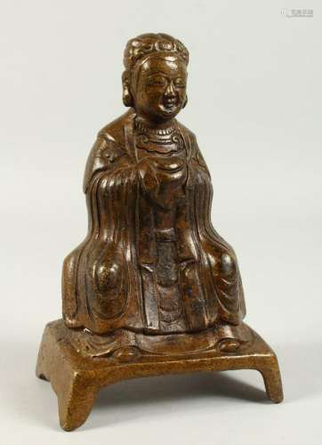 A BRONZE FIGURE OF A SEATED SCHOLAR, hands clasped
