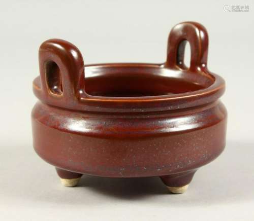 A SMALL FLAMBE STYLE TWIN-HANDLED POTTERY CENSER, on
