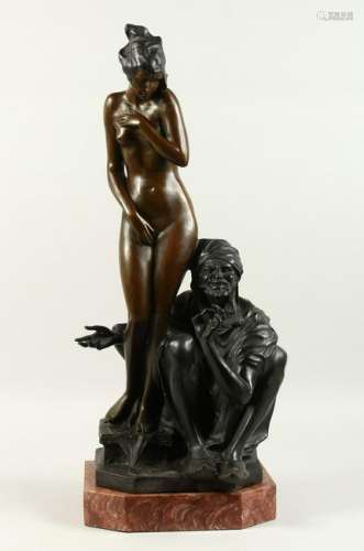 A GOOD LARGE BRONZE GROUP, of an Arab man seated by a