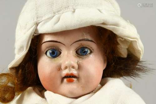 ALICE, No. 121  A SMALL BISQUE HEADED DOLL, with long