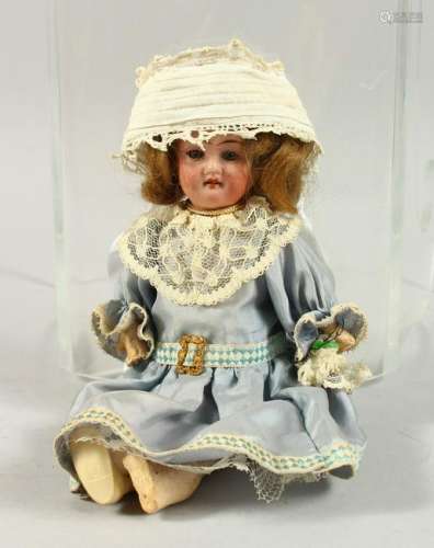 A BISQUE HEADED BABY DOLL, with articulated body.  8ins
