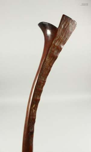 A GOOD FIJIAN CLUB, of curving form with rough hewn