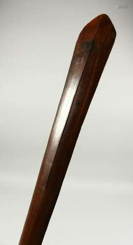 A POLYNESIAN CARVED WOOD CLUB, of broad spear tip