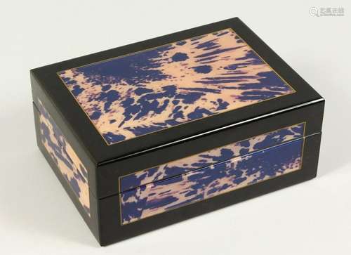 A FAUX TORTOISESHELL AND EBONISED HUMIDOR.  24cms wide