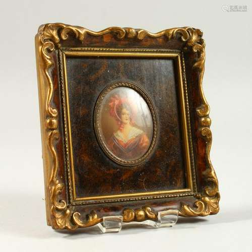 A GILT AND FAUX TORTOISESHELL FRAMED MINIATURE.