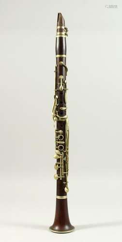 A WOODEN CLARINET. (AF)  63cms long.