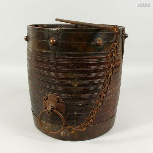 AN EARLY TURNED WOOD PAIL, with wrought iron mounts.