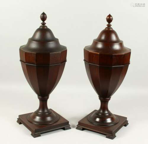 A PAIR OF GEORGE III DESIGN MAHOGANY URN SHAPE CUTLERY