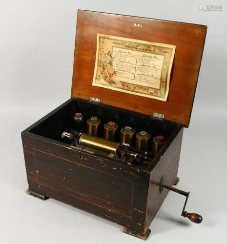 A 19TH CENTURY MUSIC BOX, with six cylinders playing 18