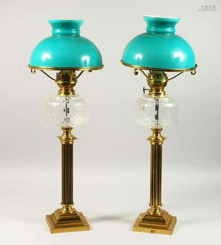 A PAIR OF VICTORIAN STYLE BRASS AND GLASS CORINTHIAN