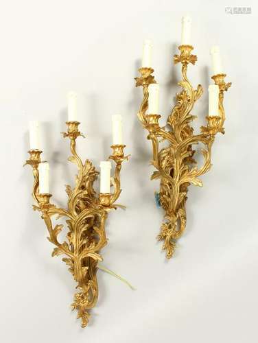 A PAIR OF ROCOCO STYLE ORMOLU FIVE BRANCH WALL