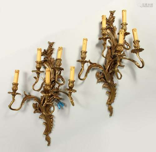 A PAIR OF ROCOCO STYLE ORMOLU FIVE BRANCH WALL