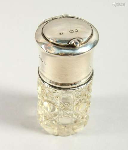 A CUT GLASS SCENT BOTTLE with stopper, the silver mount