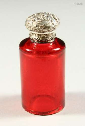 A VICTORIAN CIRCULAR RUBY GLASS SCENT BOTTLE with