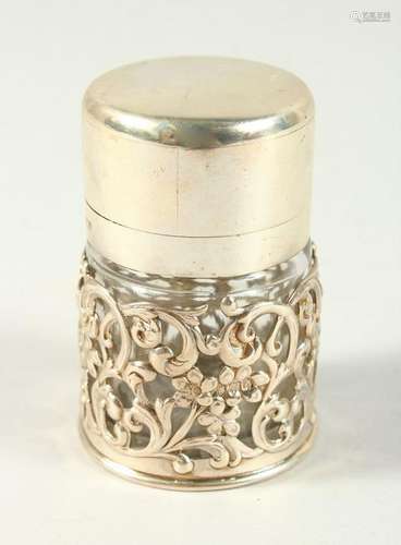 A VICTORIAN GLASS SCENT BOTTLE with plain silver top