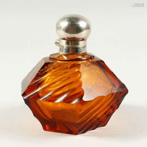 A HEXAGONAL AMBER TINTED SCENT BOTTLE AND COVER.  Maker