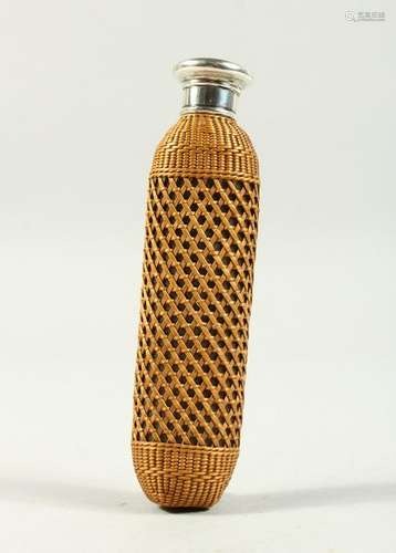 A PIERCED CANE MOUNTED SCENT BOTTLE with screw off top.