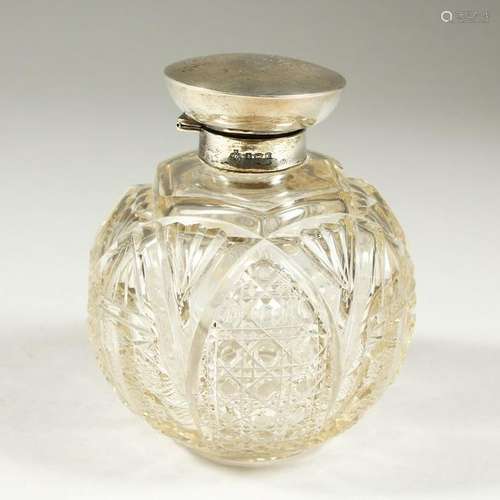 A GEORGE V CUT GLASS GLOBULAR SCENT BOTTLE with silver