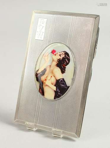 AN ENGINE TURNED CIGARETTE CASE, with an enamel oval of