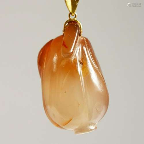 A 14CT GOLD PENDANT as a fruit.