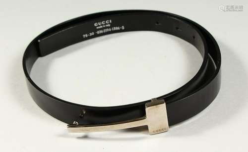 A GUCCI LEATHER STRAP.