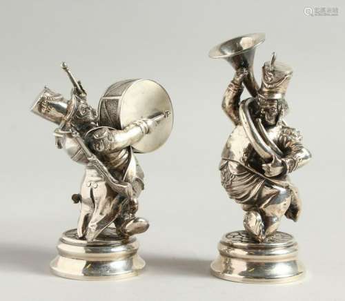 A PAIR OF AMUSING SILVER FIGURES playing musical