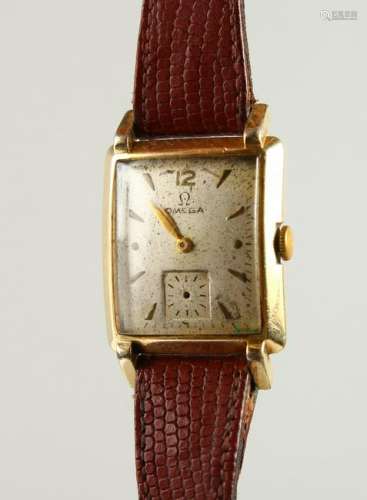 A 1930'S GOLD OMEGA WRISTWATCH, with leather strap.