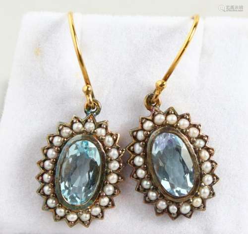 A PAIR OF 9CT GOLD AND SILVER, BLUE TOPAZ AND PEARL