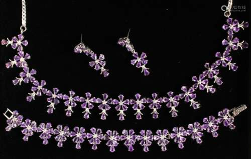 A SILVER .925 AMETHYST NECKLACE, EARRINGS AND RING.