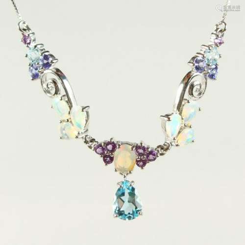 A SILVER, BLUE TOPAZ, TANZANITE AND OPAL NECKLACE.