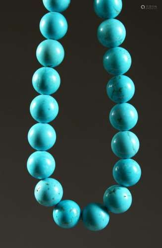 A LARGE STRING ON TURQUOISE STONES.