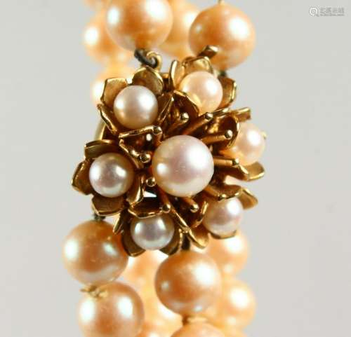 A GOOD DOUBLE ROW PEARL BRACELET, with gold clasp.