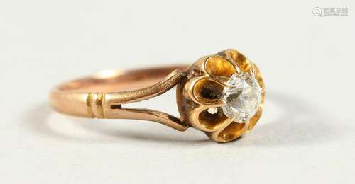 AN 18CT GOLD DIAMOND RING.