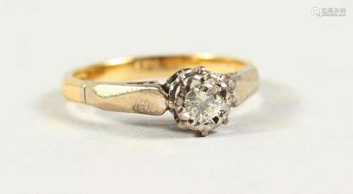 AN 18CT GOLD DIAMOND RING.